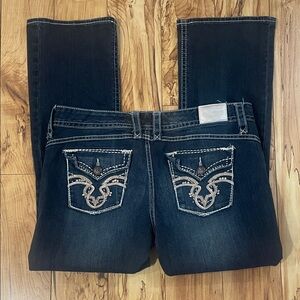 Maurices Dark Blue Boot Cut Jeans with Embroidered Back Pockets